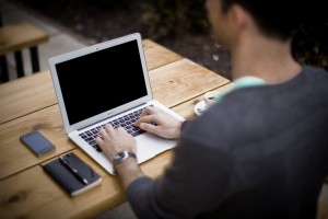 Computer work at a desk with a Laptop